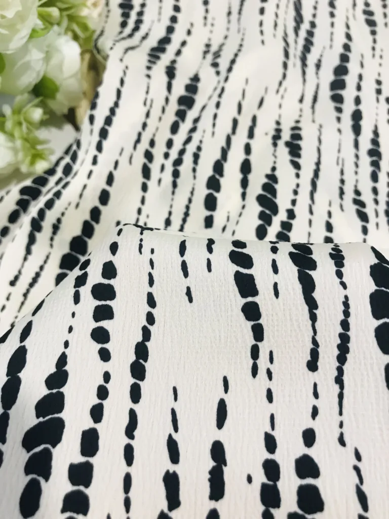 Polyester Seersucker Bubble Printed Fabric with dots print design, textured & elegant style suitable for office wear, skirts,dress,pants, summer wear, womenswear...