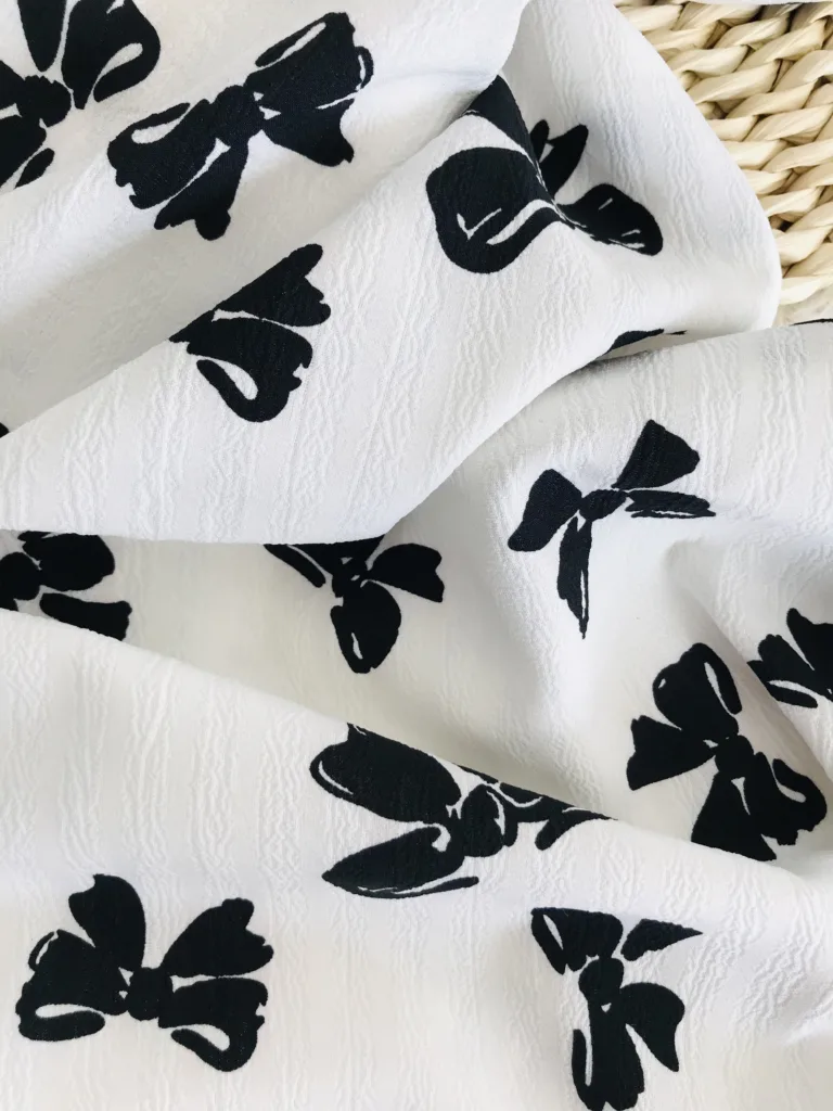 Polyester Jacquard Stripe fabric with bowtie printing design