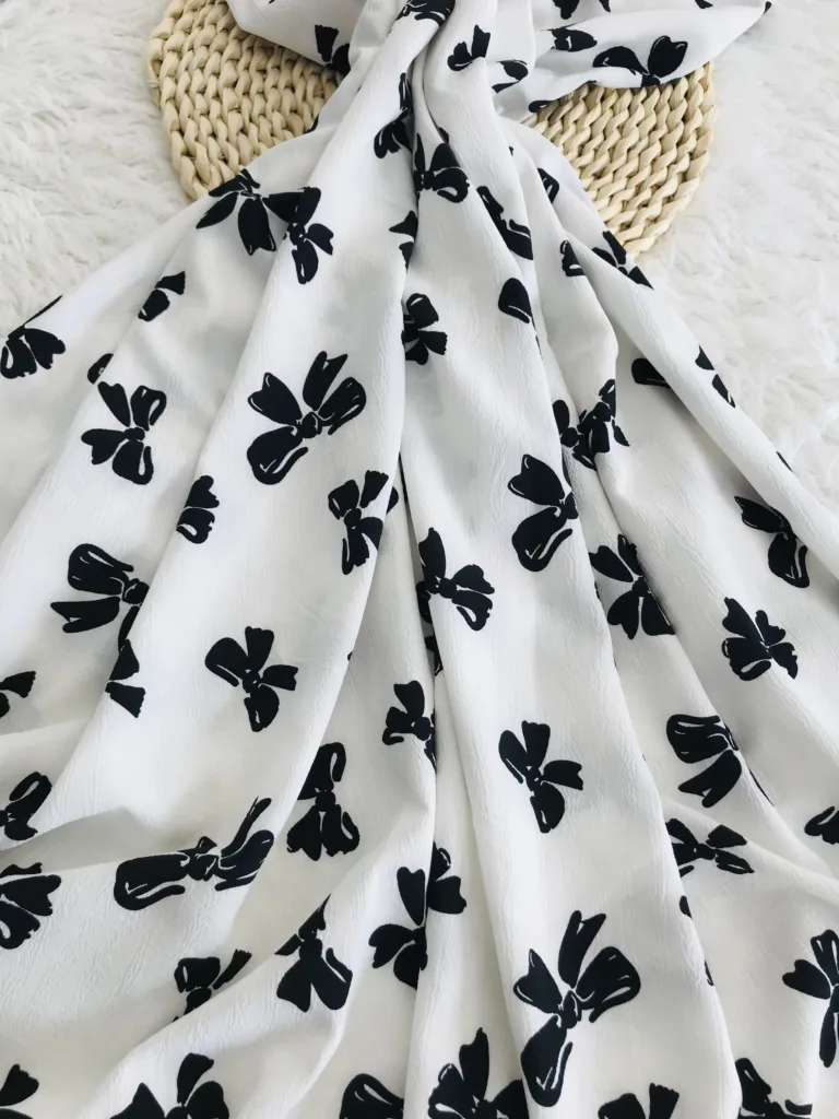 Polyester Jacquard Stripe fabric with bowtie printing design