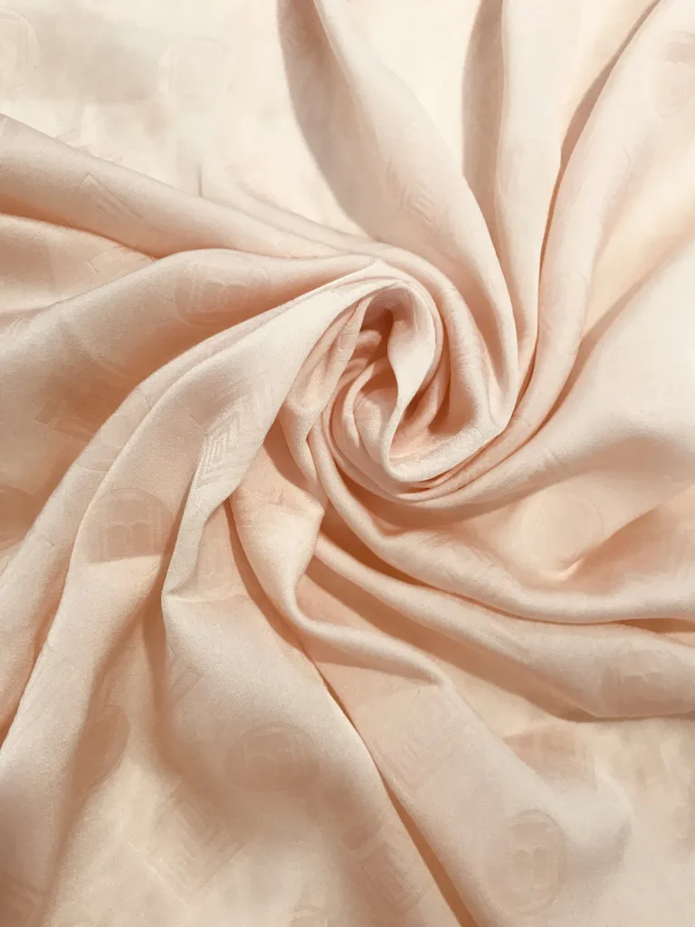 Polyester Cupro like satin with embossing