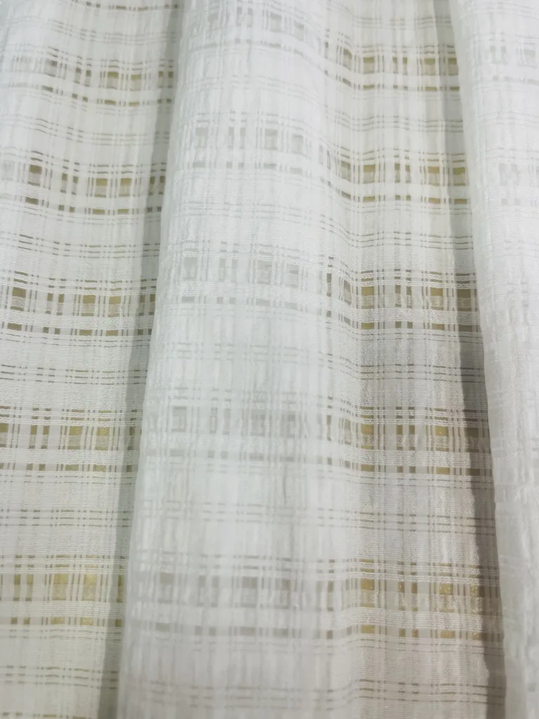 Grid textured sheer fabric